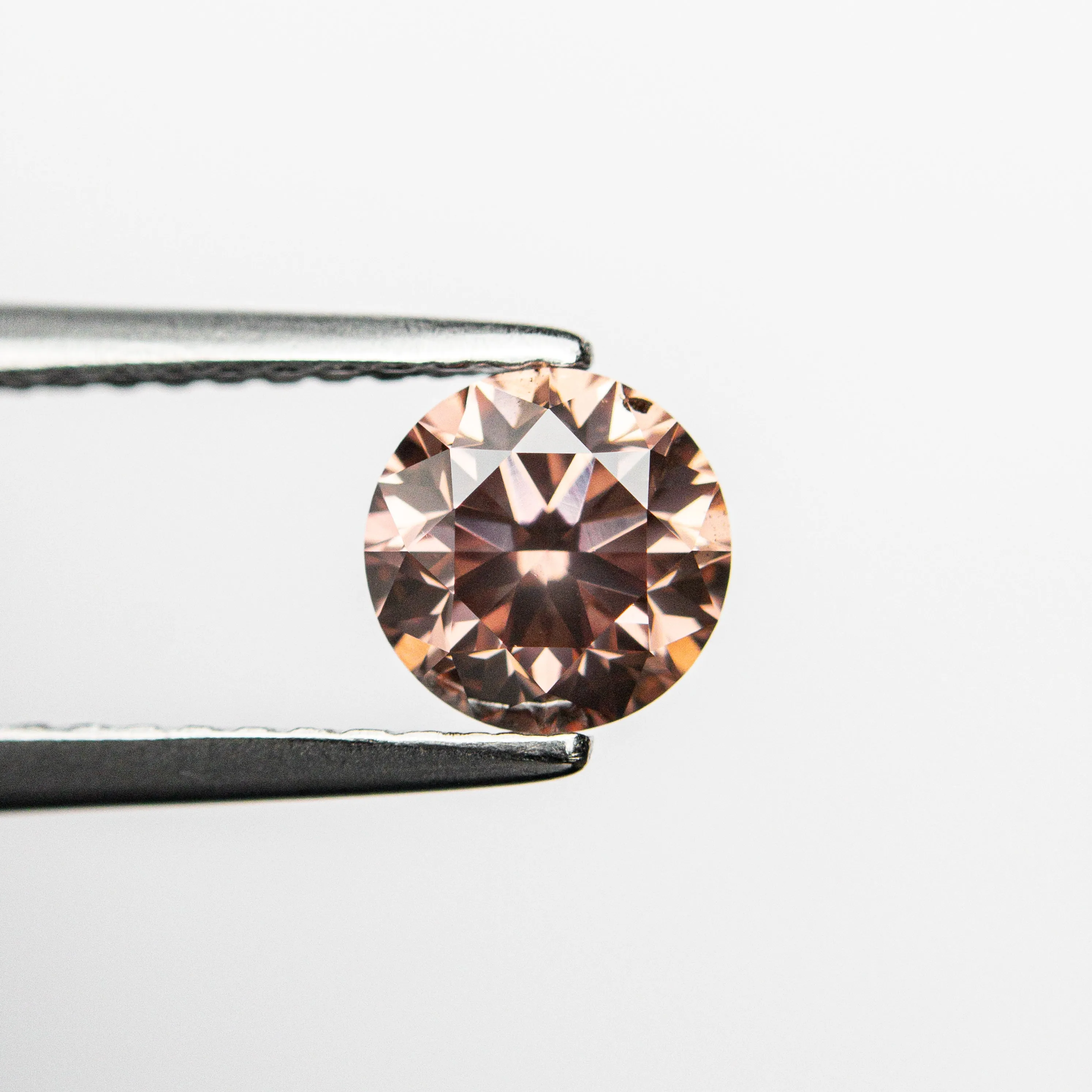 0.70ct 5.51x5.48x3.62 GIA SI1 Fancy Deep Orangy Pink Round Brilliant  24147-01