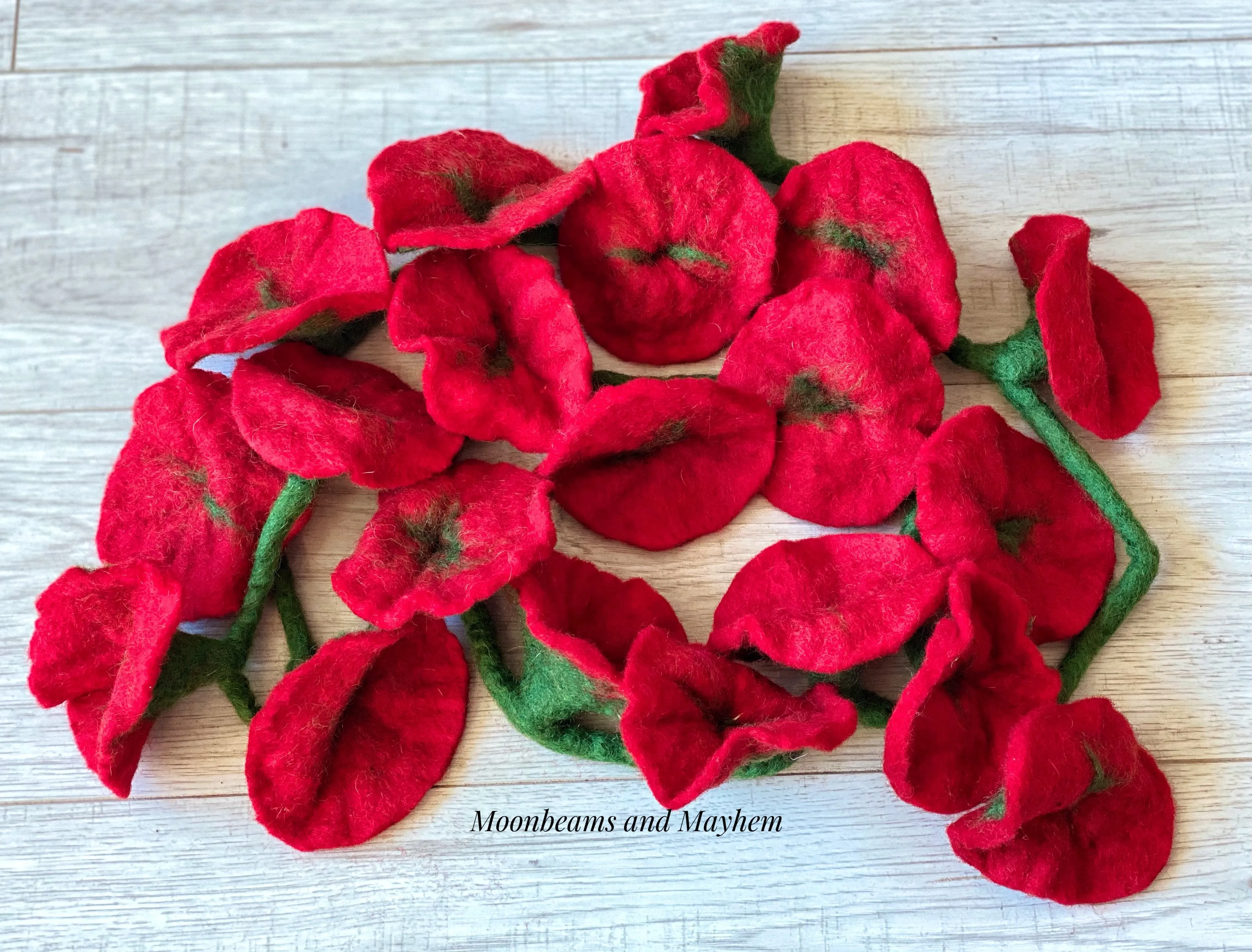 ENCHANTING RED FELTED FLOWER STRAND