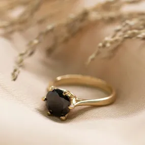 gold plated closed ring with black cz 8mm facet