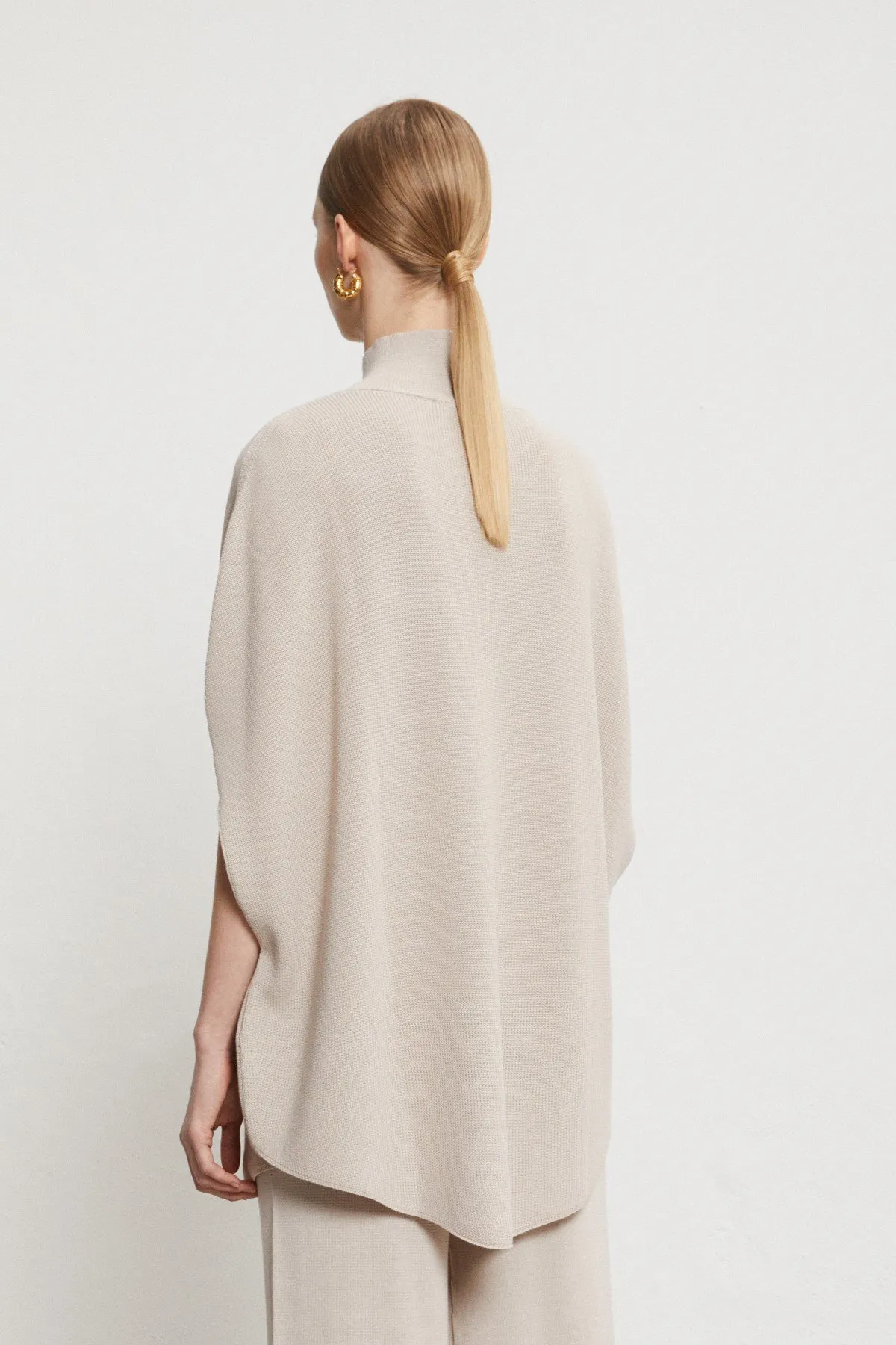 Wool blend jumper with sleeves with slits